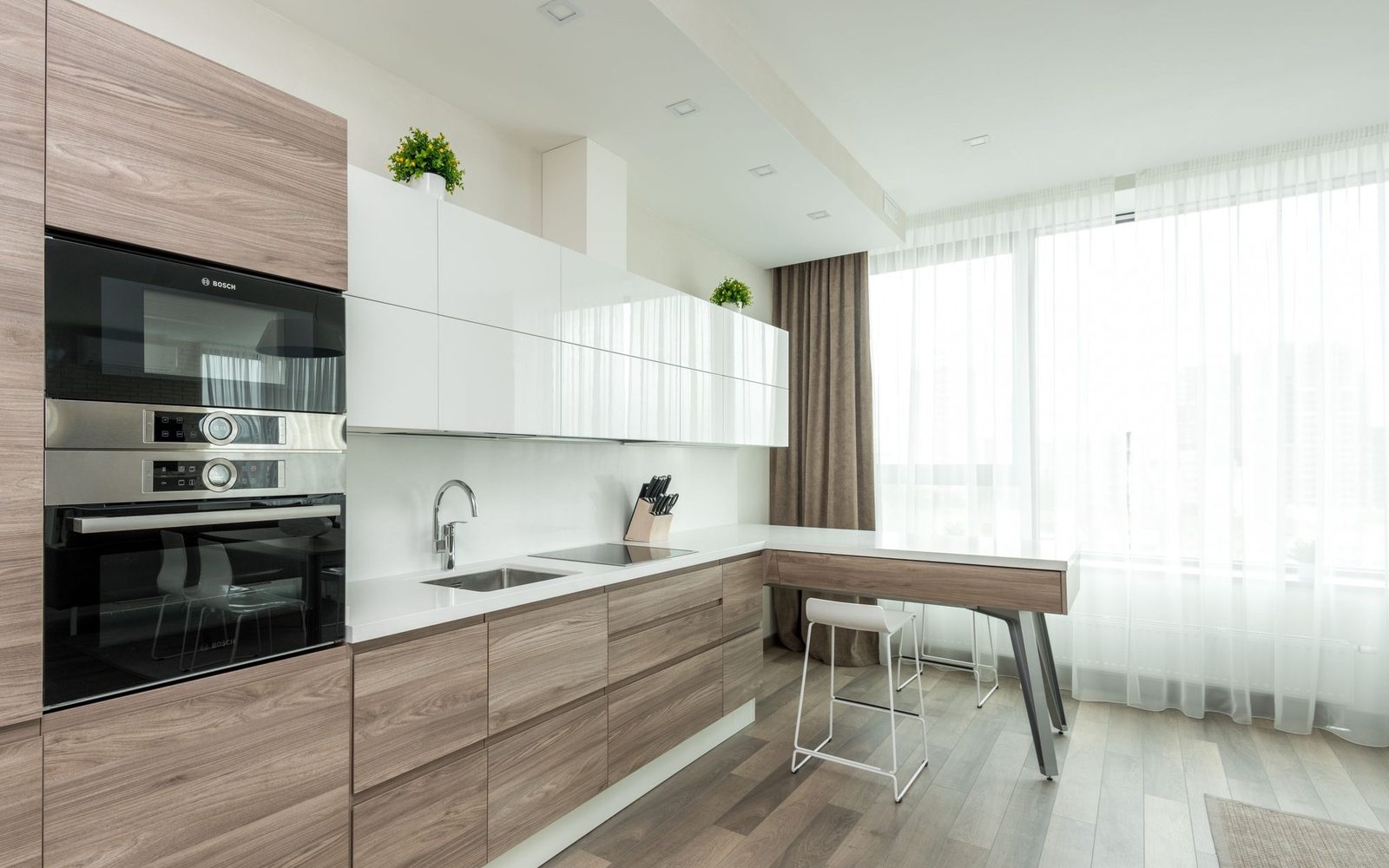 Modern kitchen with smooth sprayed cabinet doors